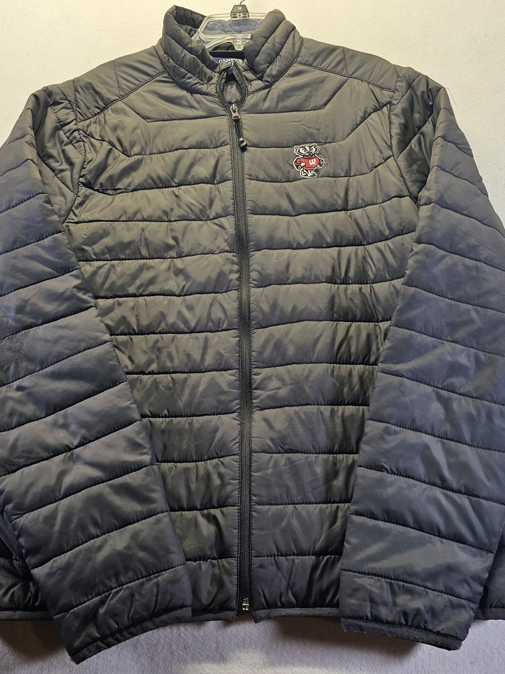 Campus Heritage Blue and White Brand Label Wisconsin Badgers Puffer Jacket.